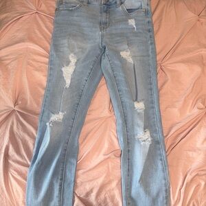 Distressed Light Blue Jeans